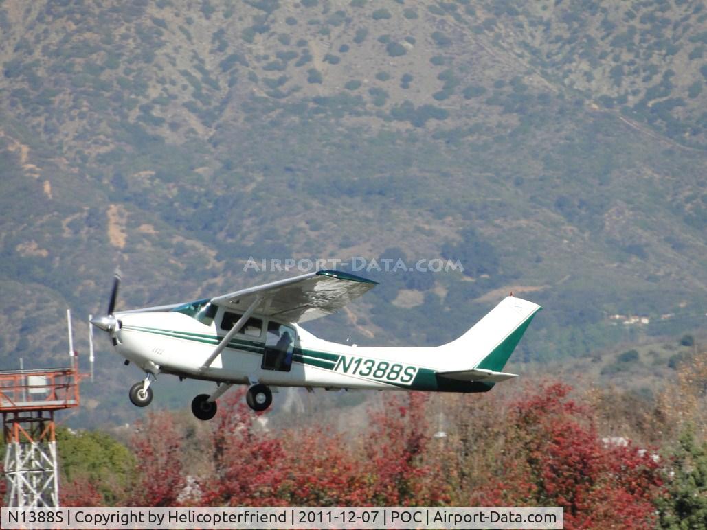 N1388S, 1976 Cessna 182P Skylane C/N 18264949, Airbourne from runway 26R, passing the autumn trees