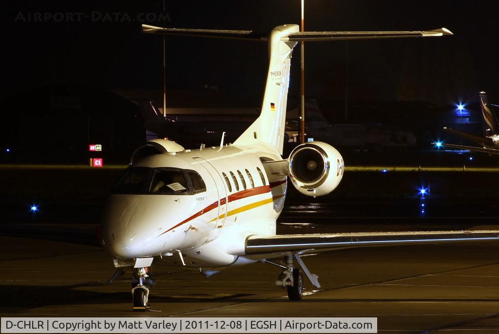 D-CHLR, 2011 Embraer EMB-505 Phenom 300 C/N 50500066, Sat on stand at SaxonAir.