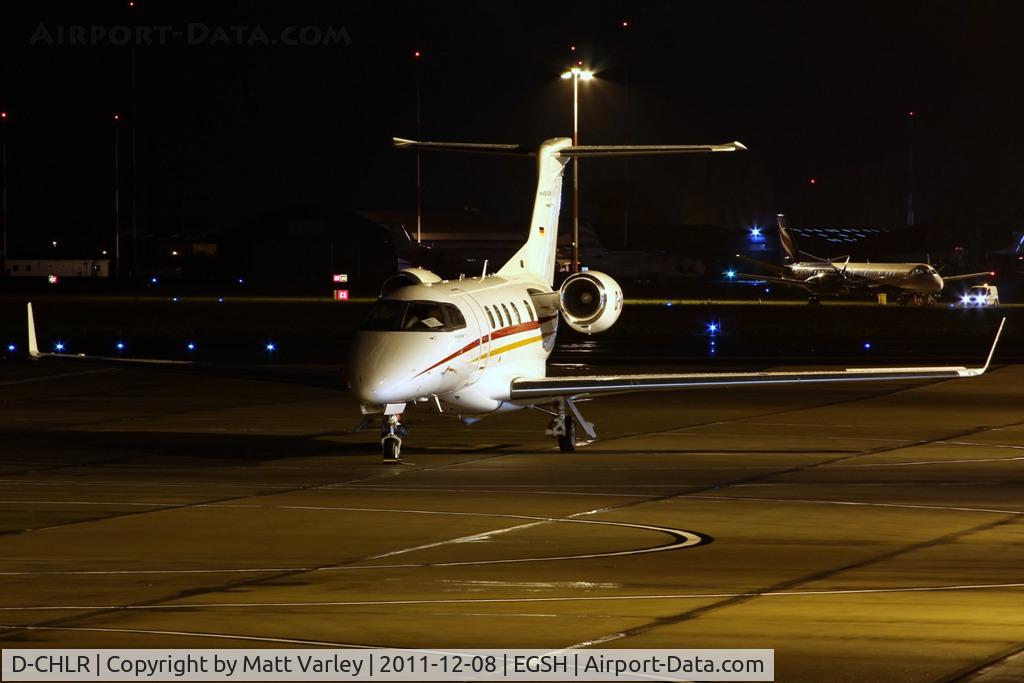 D-CHLR, 2011 Embraer EMB-505 Phenom 300 C/N 50500066, Sat on stand at SaxonAir.