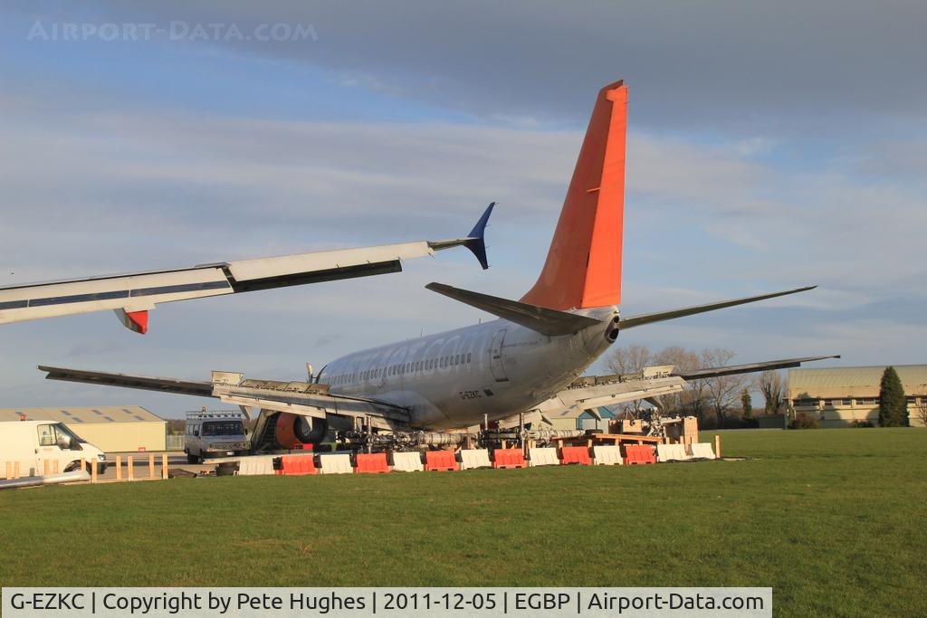 G-EZKC, 2004 Boeing 737-73V C/N 32424, G-EZKC built 2004, at the end of its life 2011 - in the scrapping area at Kemble