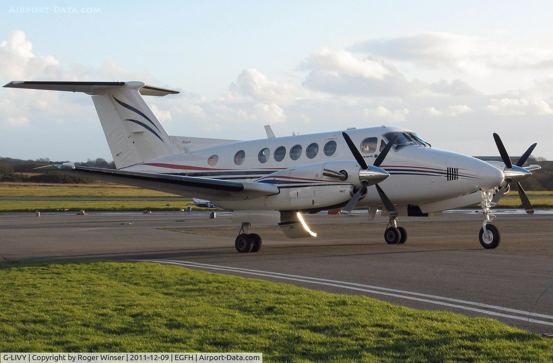 G-LIVY, 1977 Beech 200 Super King Air C/N BB-209, Super King Air of Dragonfly Aviation Services on the apron.