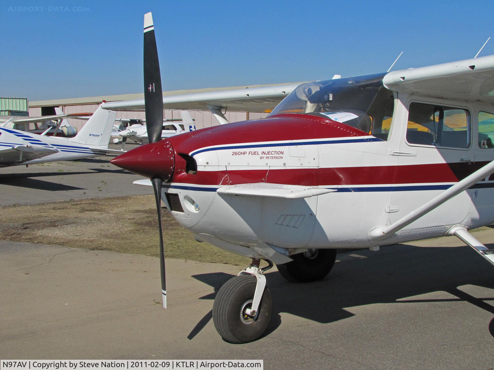 N97AV, 1979 Cessna 182Q Skylane C/N 18266809, Forward fuselage of highly modified 1979 Cessna 182Q with bush operations big wheels, canards on forward fuselage and 