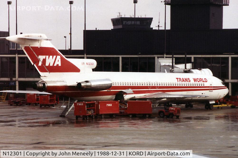 N12301, 1968 Boeing 727-231 C/N 19558, Rainy day at ORD. Scanned from a print.