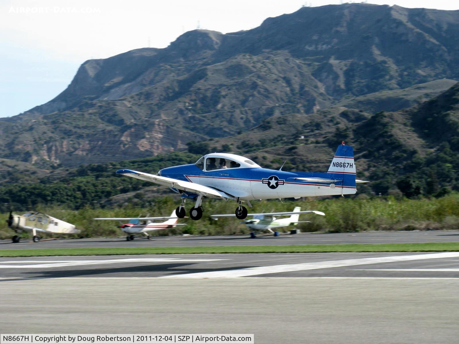 N8667H, 1947 North American Navion C/N NAV-4-667, 1947 North American NAVION, Continental IO-520 285 Hp upgrade, Young Eagles Flight-aircraft & pilot have given well over 600 children free first airplane rides, takeoff climb Rwy 04