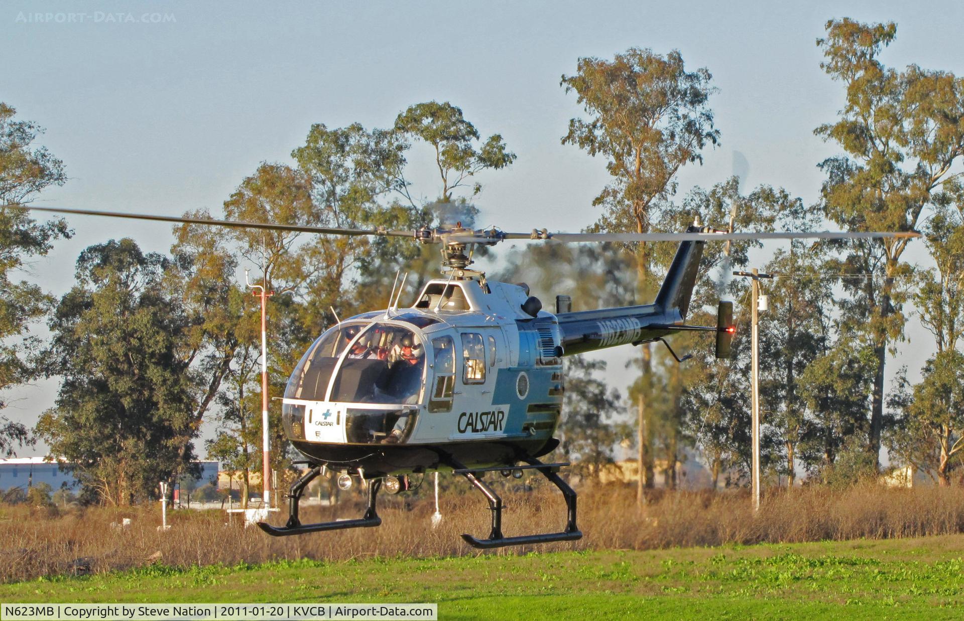 N623MB, 1986 MBB Bo-105CBS-5 C/N S-750, CALSTAR 1986 MBB BO-105S lifts off @ Nut Tree Airport, CA (note 