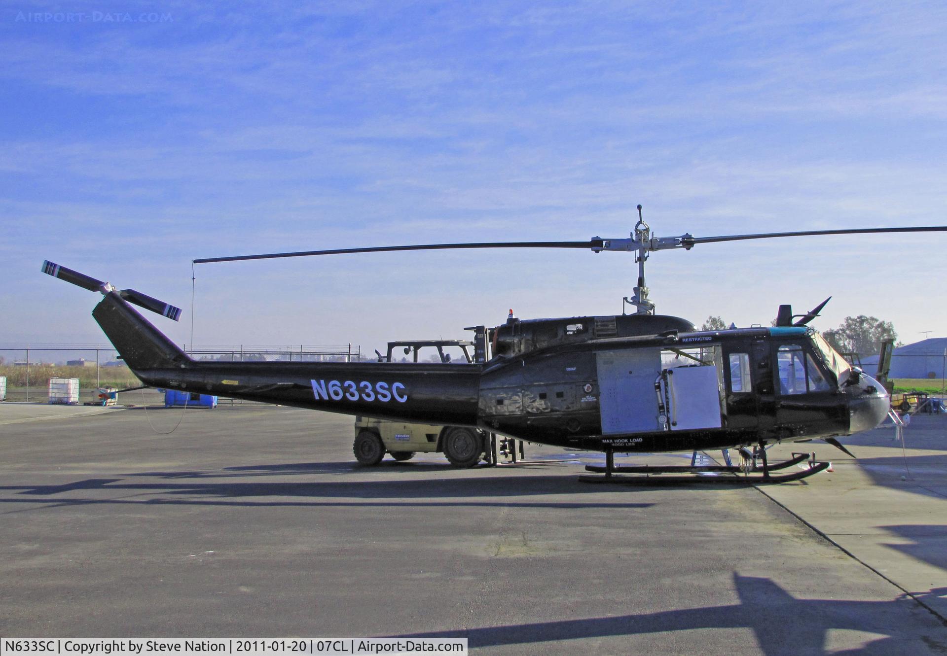 N633SC, Bell UH-1H C/N 67-17633, Recently acquired AvAg Inc (Richvale, CA) all black  UH-1H (ex 67-17633) @ operators home strip