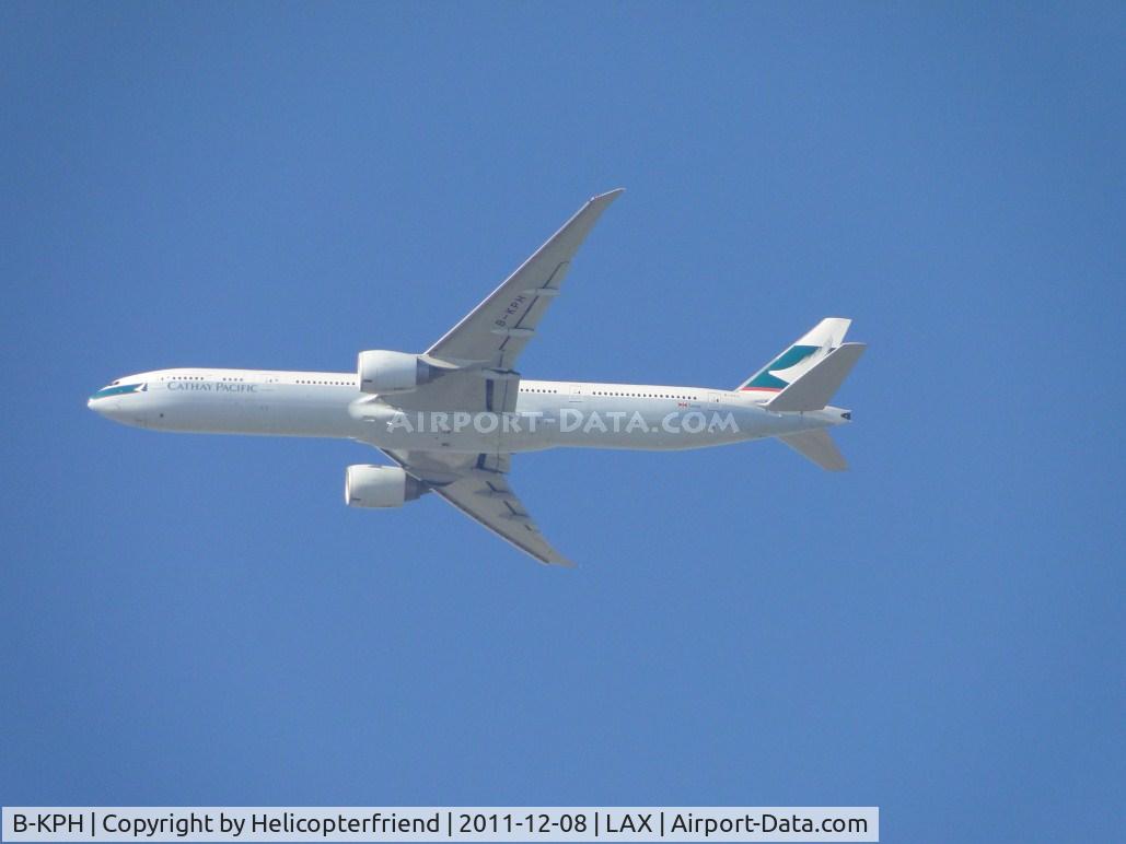 B-KPH, 2008 Boeing 777-367/ER C/N 35301, On final for runway 24 taken from Bell, Calif approximately 20 miles east of LAX