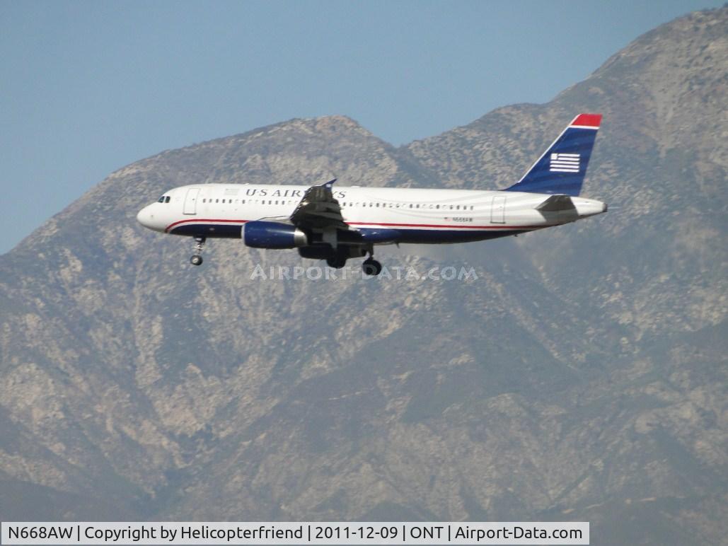N668AW, 2002 Airbus A320-232 C/N 1764, On final for runway 26