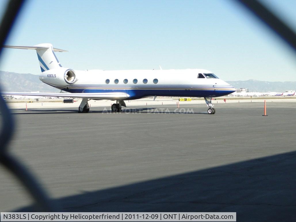 N383LS, 1998 Gulfstream Aerospace G-IV C/N 544, Couldn't get close enough to ship, took photo through fence at parking area