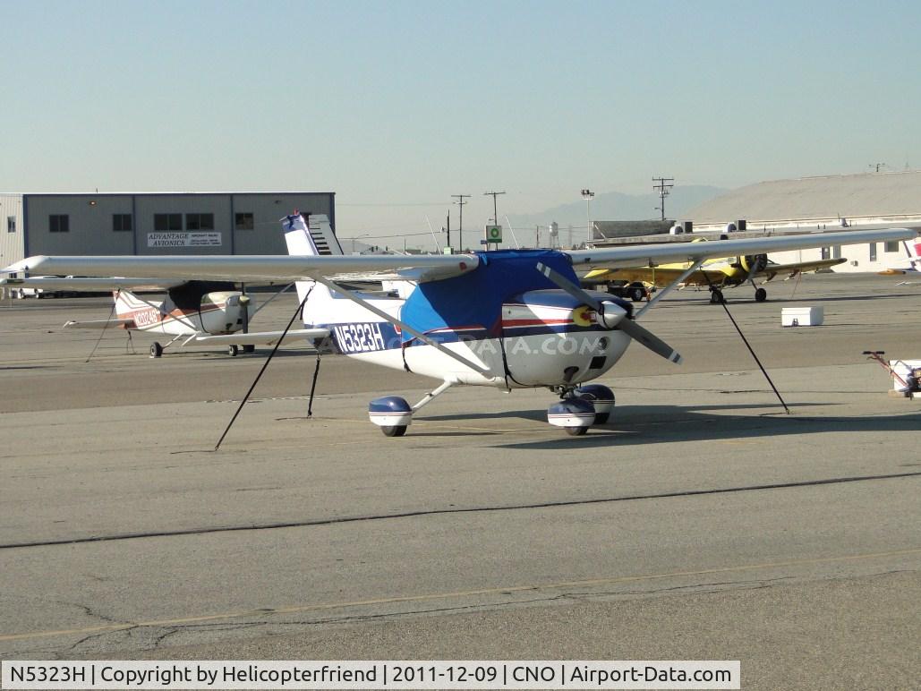 N5323H, 1975 Cessna 172M C/N 17265403, Tied down, covered and parked in the northside parking area