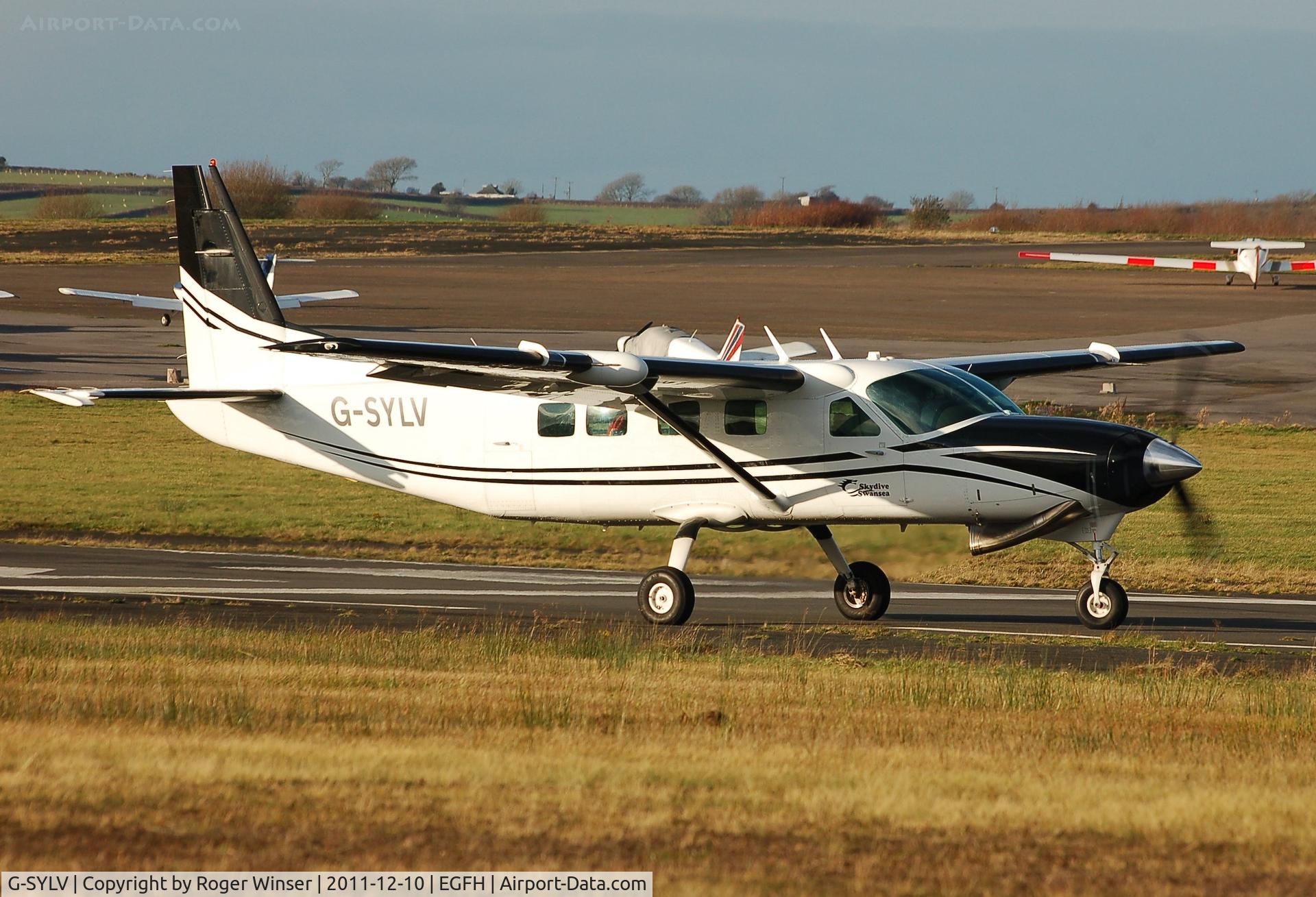 G-SYLV, 2002 Cessna 208B  Grand Caravan C/N 208B0936, Newly registered G-SYLV. Was registered D-FAAH.
Operated by Skydive Swansea.
