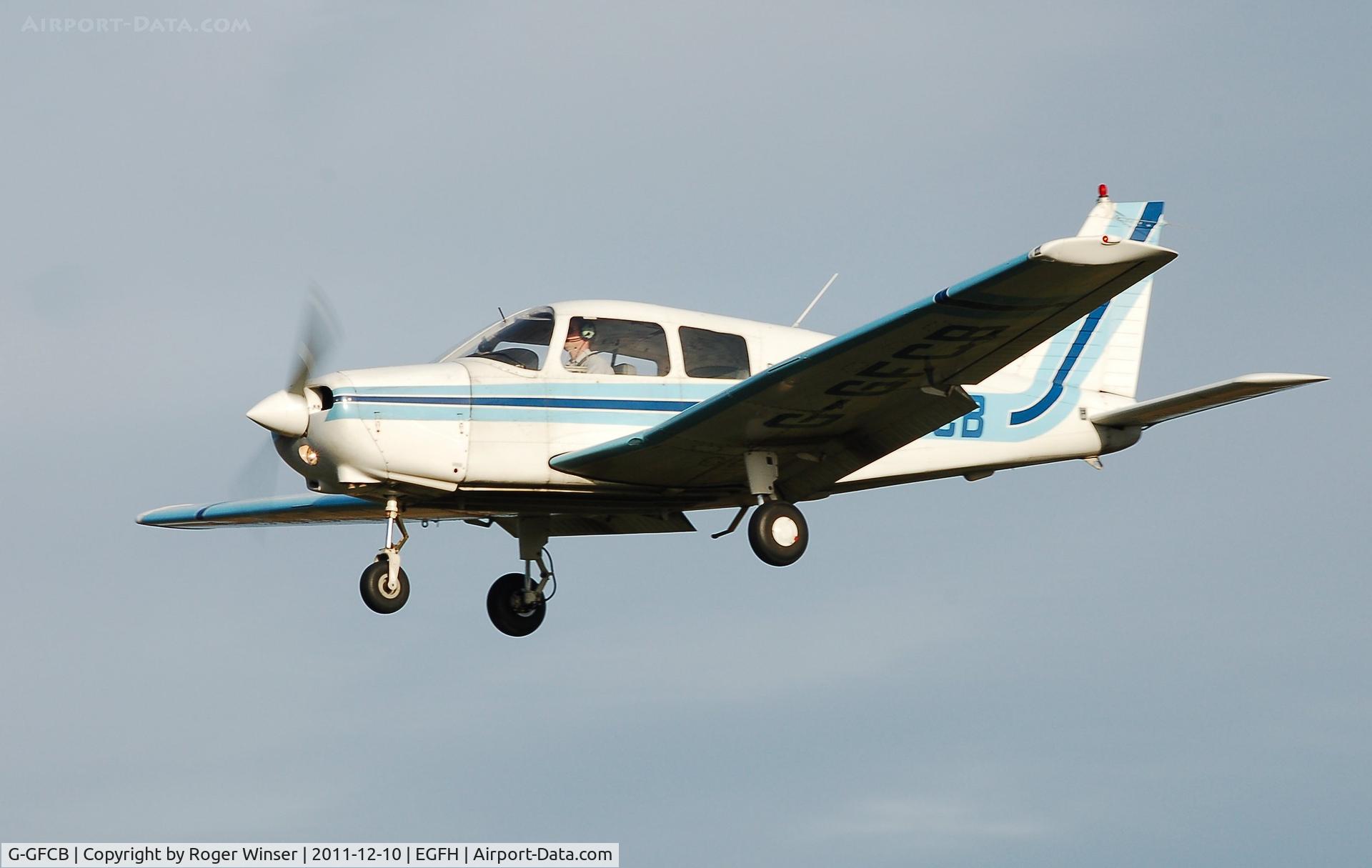 G-GFCB, 1989 Piper PA-28-161 Cadet C/N 2841101, Piper Cadet on finals to Runway 28. Marked BRISTOL AVIATION.