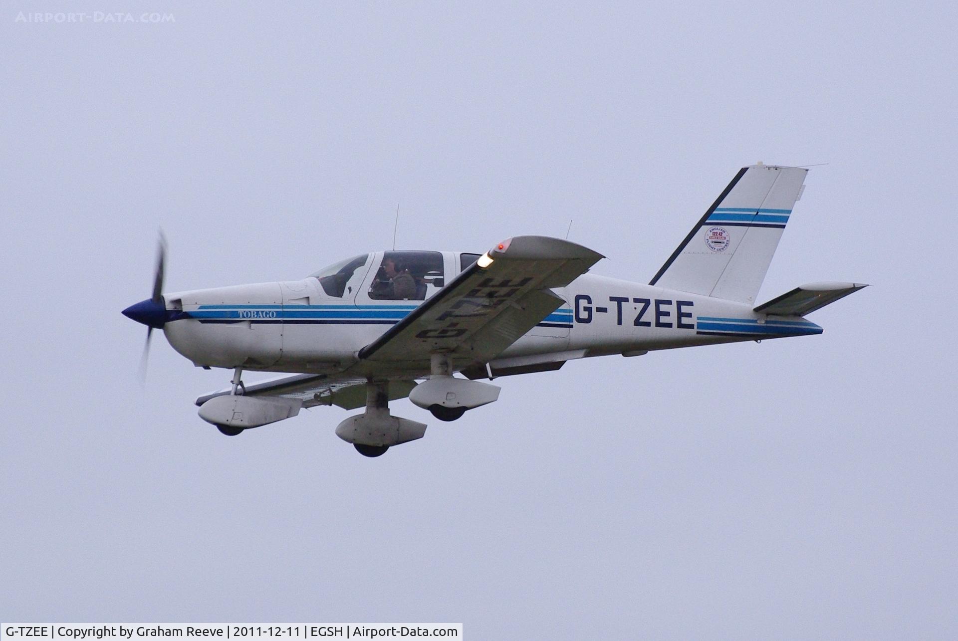 G-TZEE, 1987 Socata TB-10 Tobago C/N 727, About to land at Norwich.