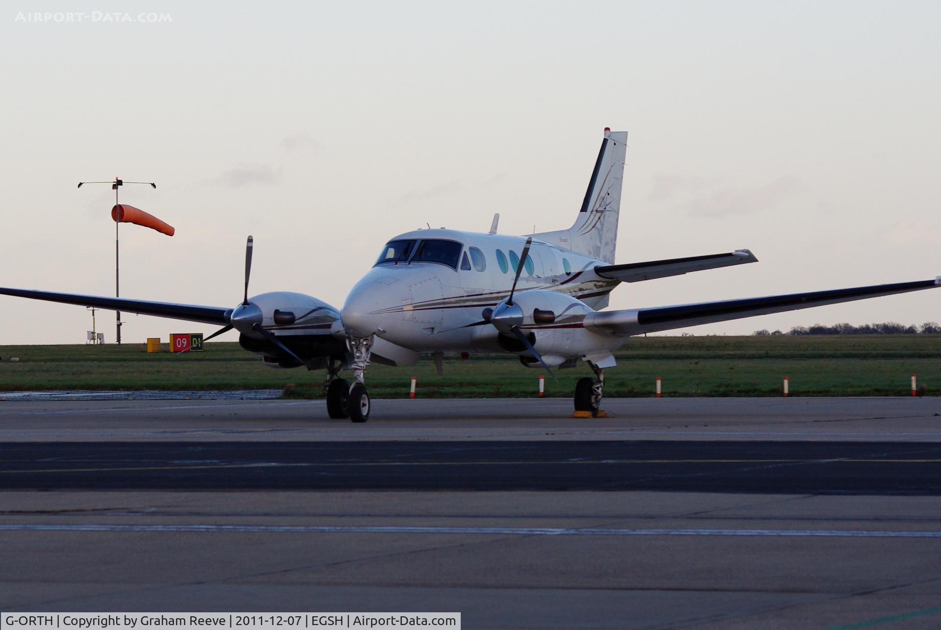 G-ORTH, 1975 Beech E90 King Air C/N LW-136, Parked at Norwich.