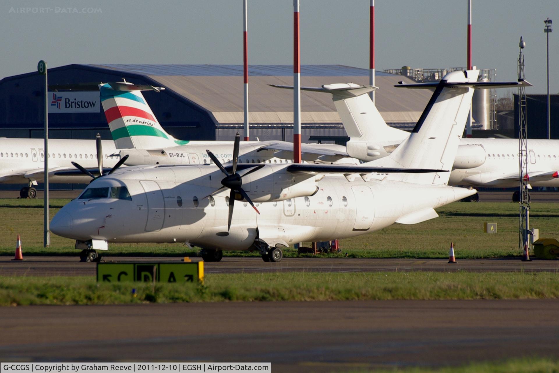 G-CCGS, 1998 Dornier 328-100 C/N 3101, Parked at Norwich.