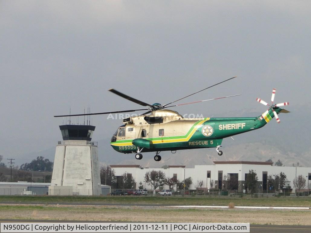 N950DG, Sikorsky UH-3H Sea King C/N 149724, Airbourne and westbound getting ready to pass the tower