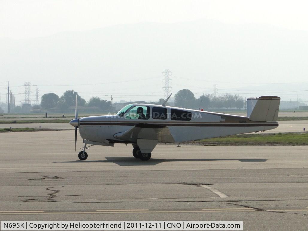 N695K, 1950 Beech B35 C/N D-2243, Taxiing for take off from runway 26R