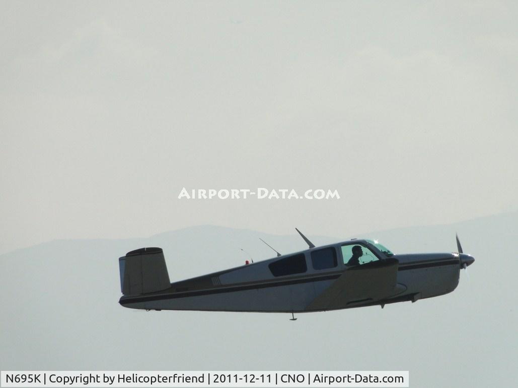 N695K, 1950 Beech B35 C/N D-2243, Wheels retracted and headed westbound