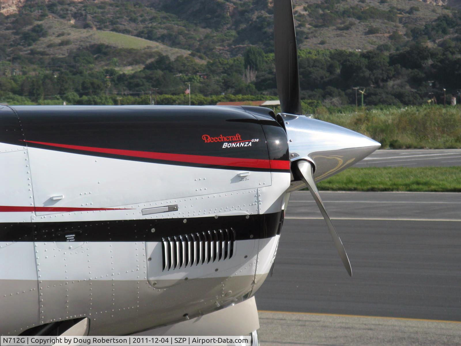 N712G, Hawker Beechcraft G36 C/N E-3965, 2011 Hawker Beech G36 BONANZA, Continental IO-550-B 300 Hp, cowl logo