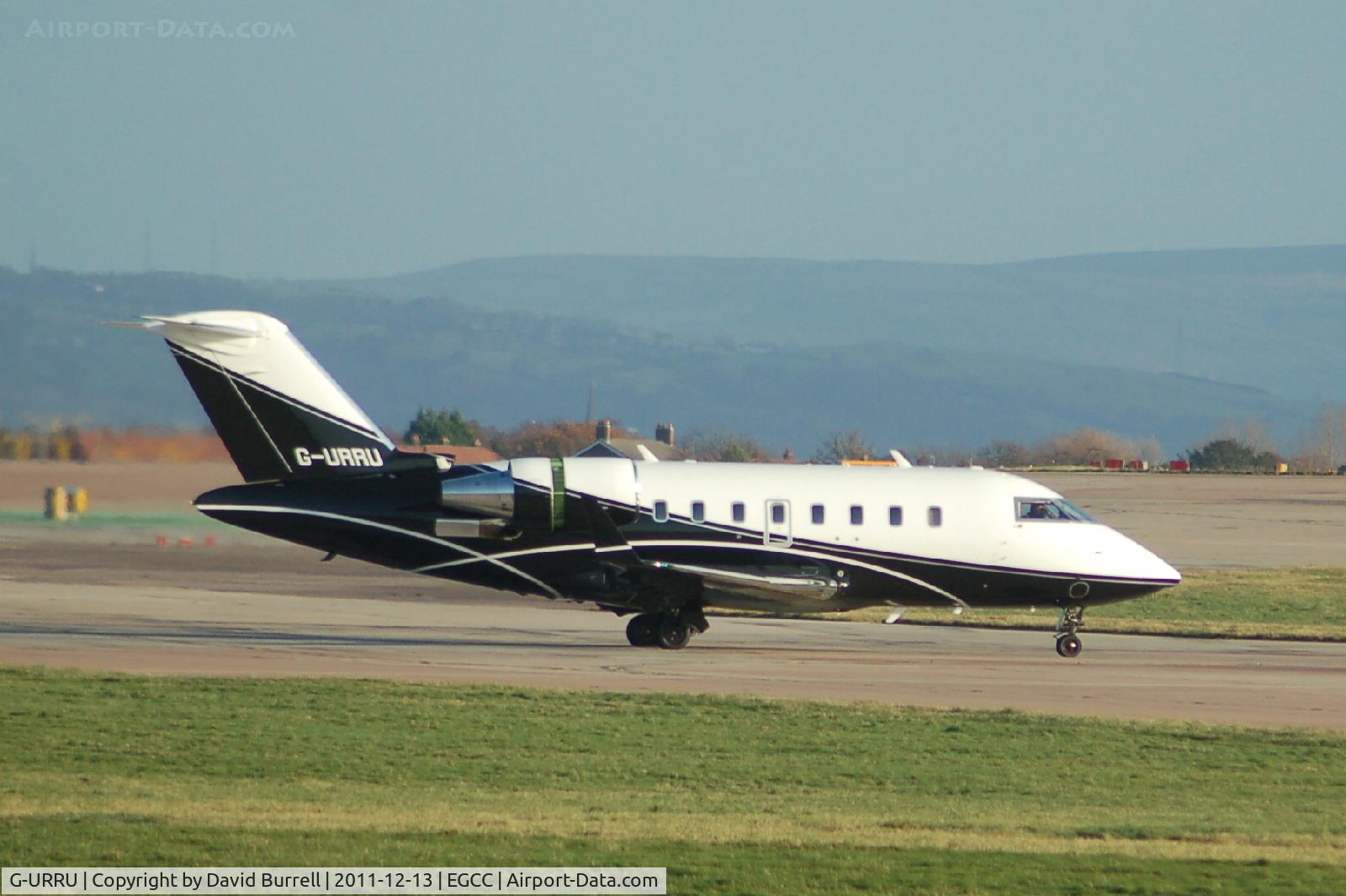 G-URRU, 2009 Bombardier Challenger 605 (CL-600-2B16) C/N 5821, Bombardier Cl-600-2b16 taxiing Manchester Airport.