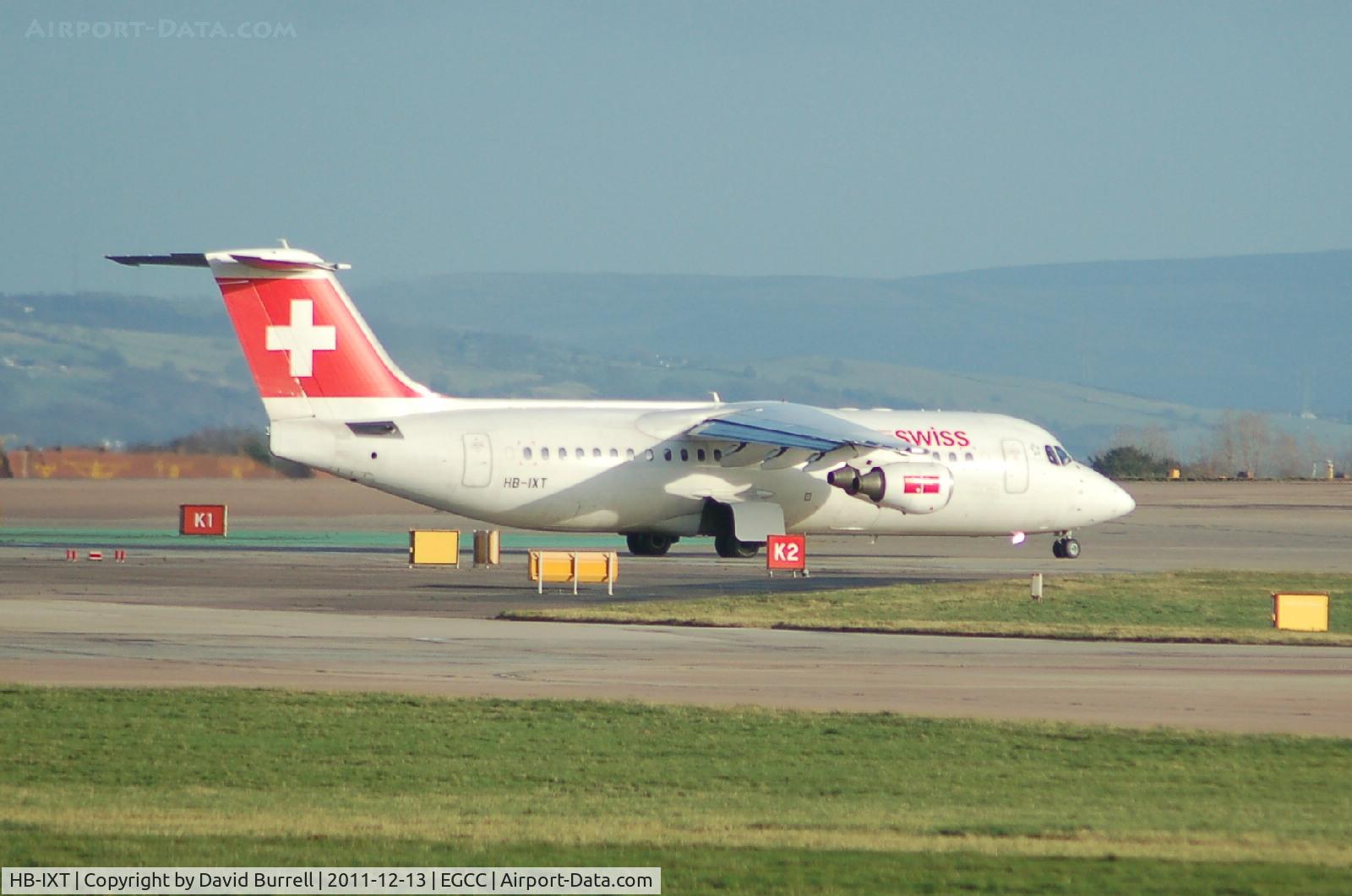 HB-IXT, 1995 British Aerospace Avro 146-RJ100 C/N E3259, Swiss HB-IXT British Aerospace Avro 146 RJ-100 Taxiing Manchester Airport.