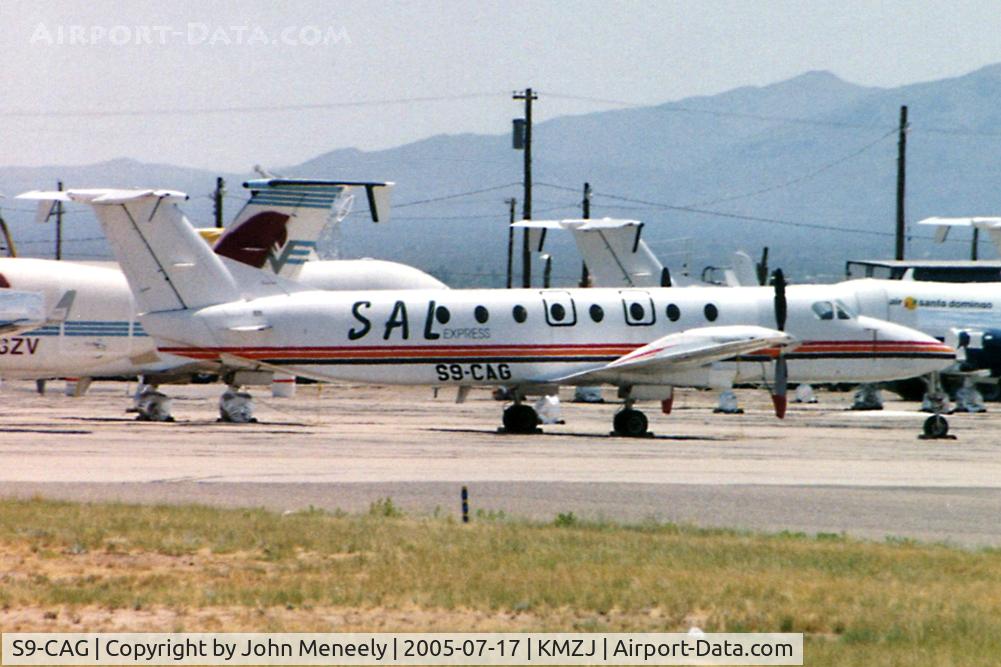 S9-CAG, 1991 Beech 1900C C/N UC-157, Scanned from a print (cropped). De-registered in April 2005, but seen here still wearing its S9-CAG in July '05.