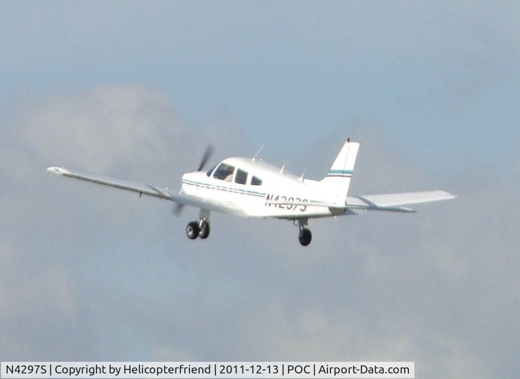N4297S, 1983 Piper PA-28-181 C/N 28-8390045, Headed westbound after taking off from runway 26R