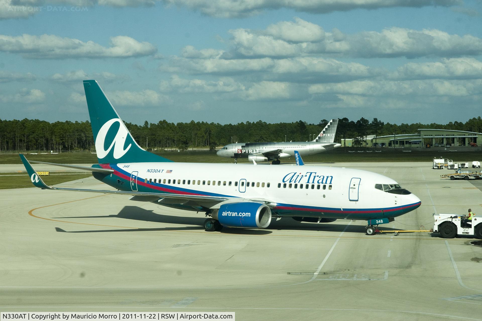 N330AT, 2007 Boeing 737-7BD C/N 36399, Pushing an AirTran at RSW (and a piggybacking Spirit)