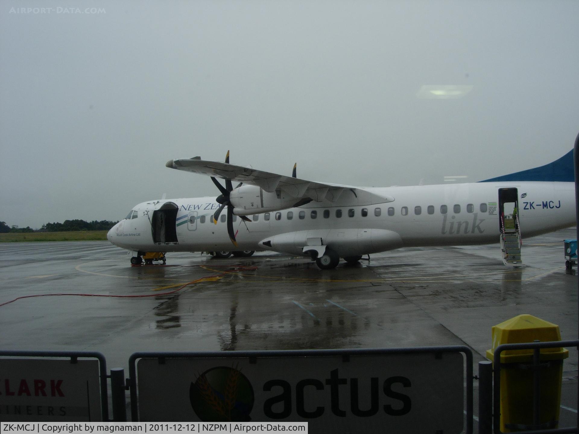 ZK-MCJ, 1999 ATR 72-212A C/N 624, Awaiting my flight home in the rain. Actually had to descend due to airframe icing up!