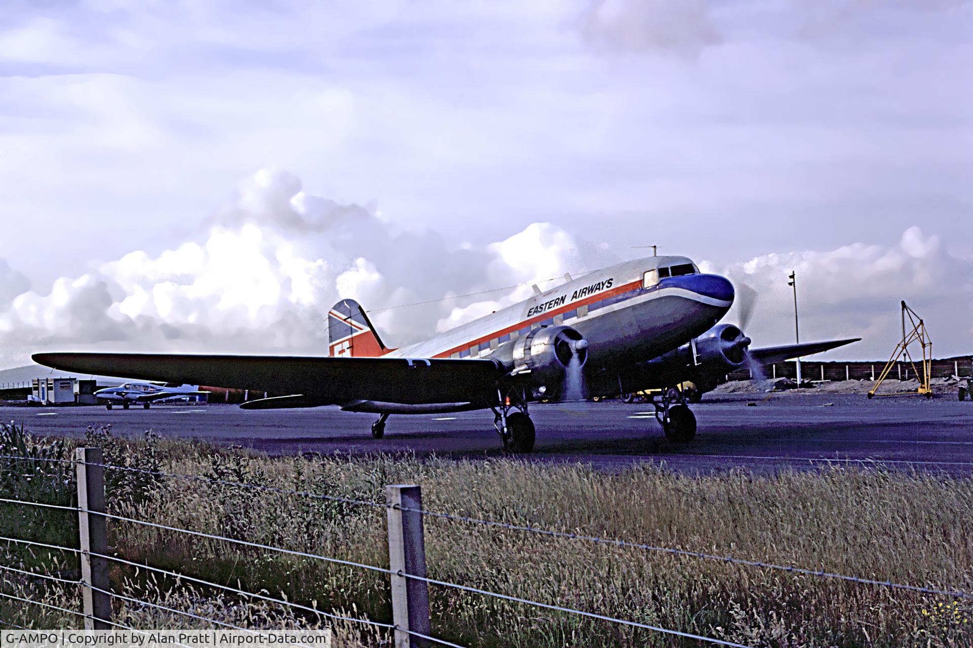 G-AMPO, 1944 Douglas DC-3C-R-1830-90C (C-47B) C/N 33186, In Eastern Airways livery taxies to terminal early 1980s