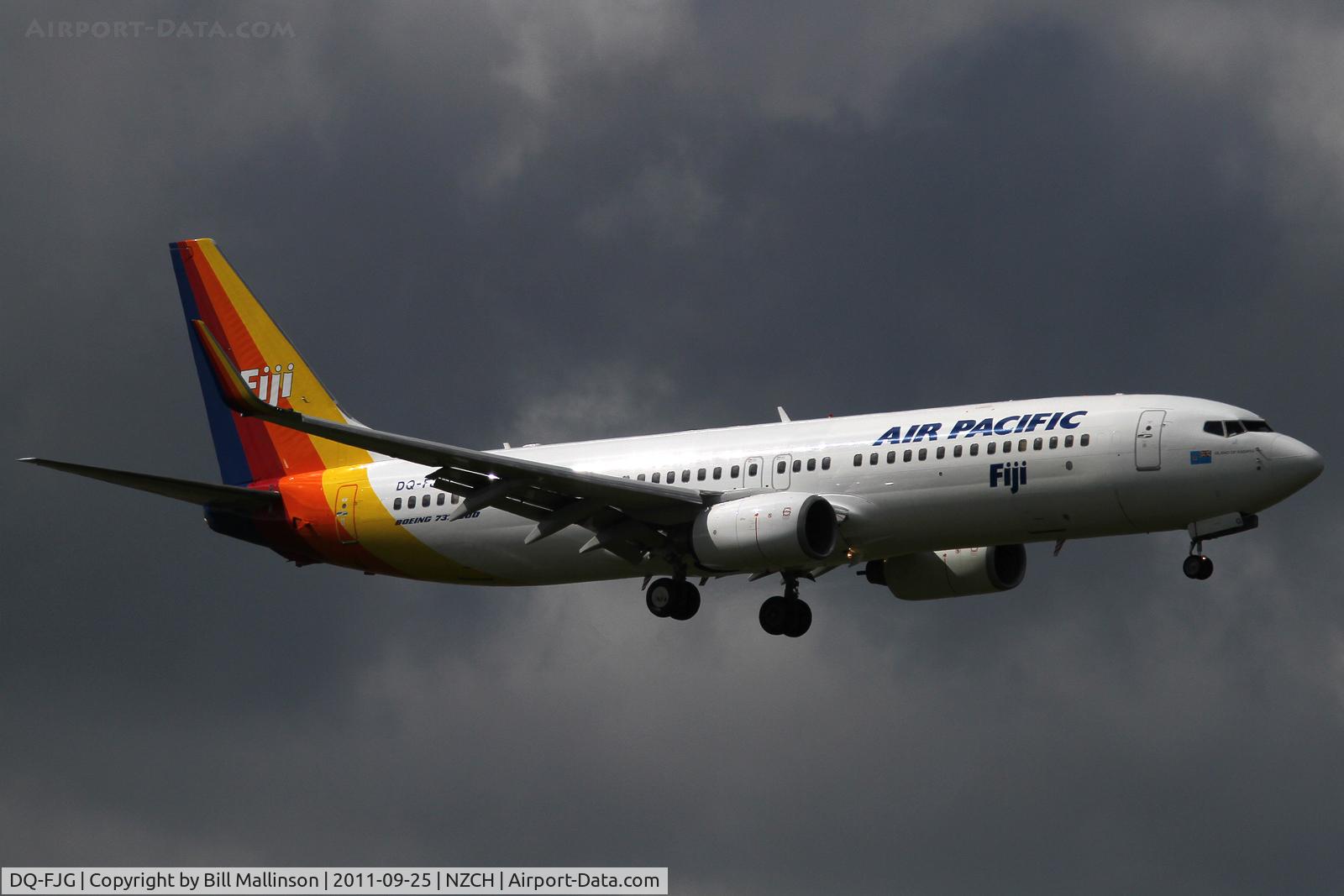 DQ-FJG, 1999 Boeing 737-8X2 C/N 29968, in to 20, before the storm breaks