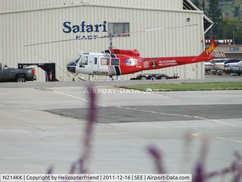 N214KK, 1964 Bell UH-1H Iroquois C/N 4267 (64-13560), Lifting off from the northside of runway 27R