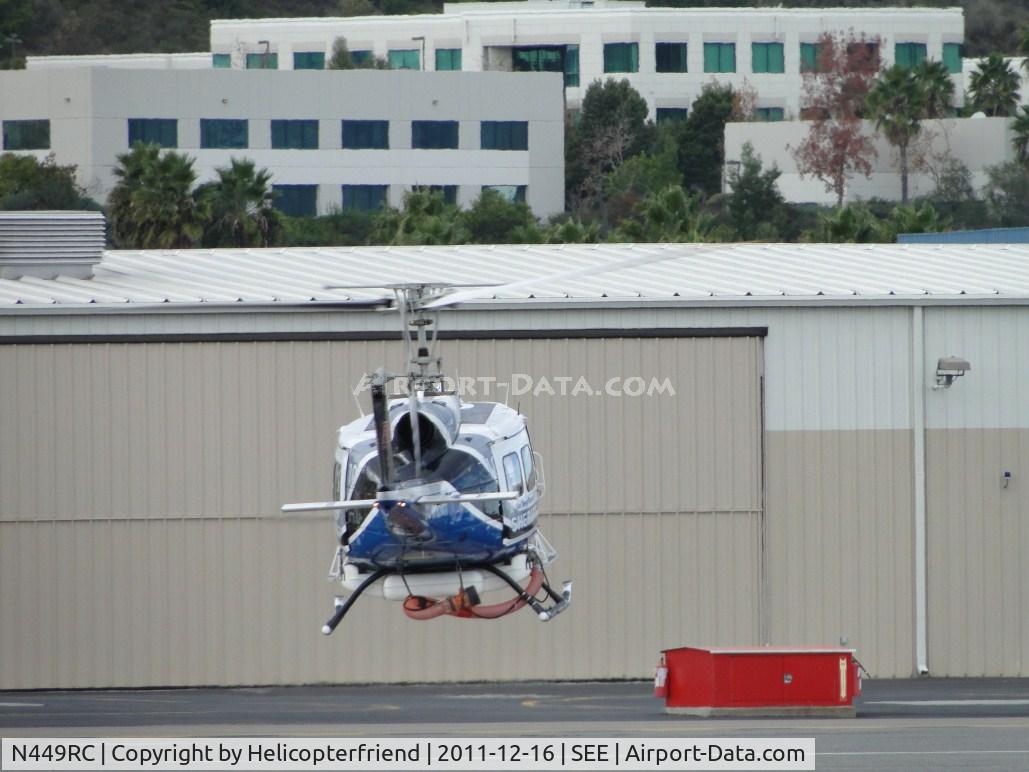 N449RC, 1973 Bell 205A-1 C/N 30121, Lift off still facing the hanger