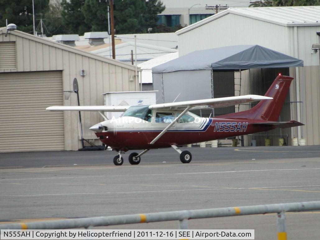 N555AH, 1977 Cessna 182Q Skylane C/N 18265573, Standing by at runway 35 while San Diego County Sheriff helicopter (N449RC) departs