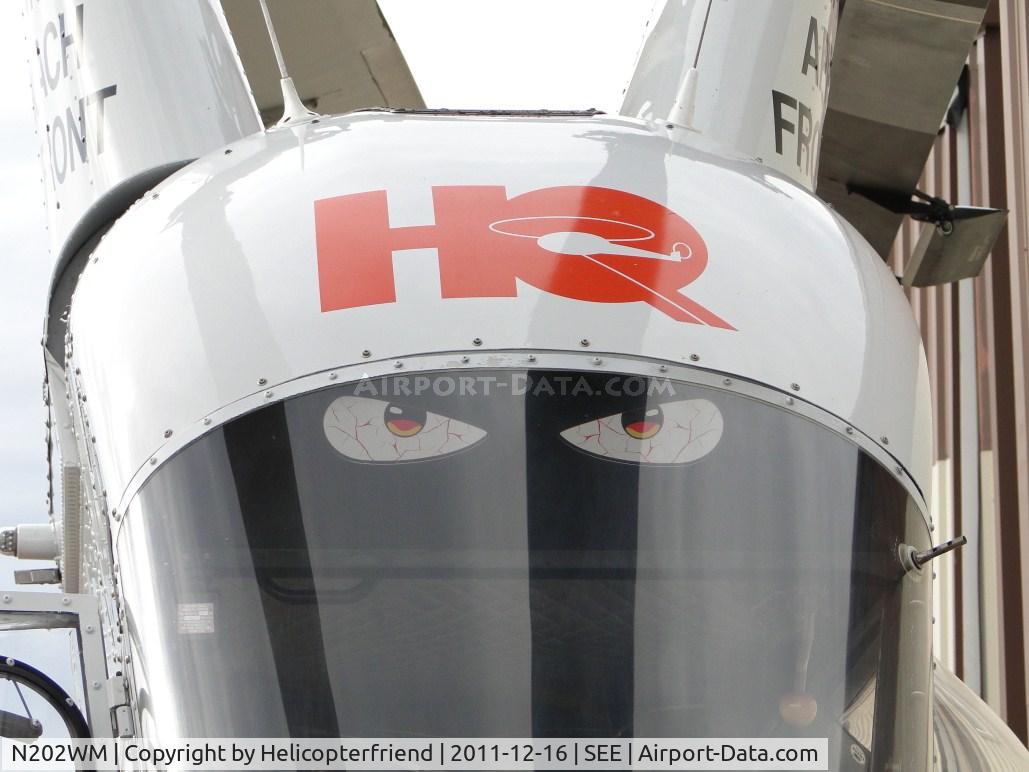 N202WM, 1995 Kaman K-1200 K-Max C/N A94-0011, Scowling but keeping a watchful eye on everything