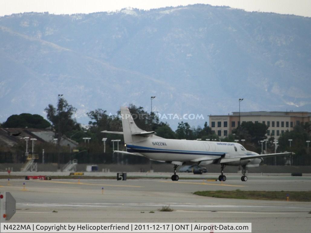 N422MA, 1986 Fairchild SA-227AC Metro III C/N AC-635, Rolling out after landing on runway 8R heading to UPS parking area