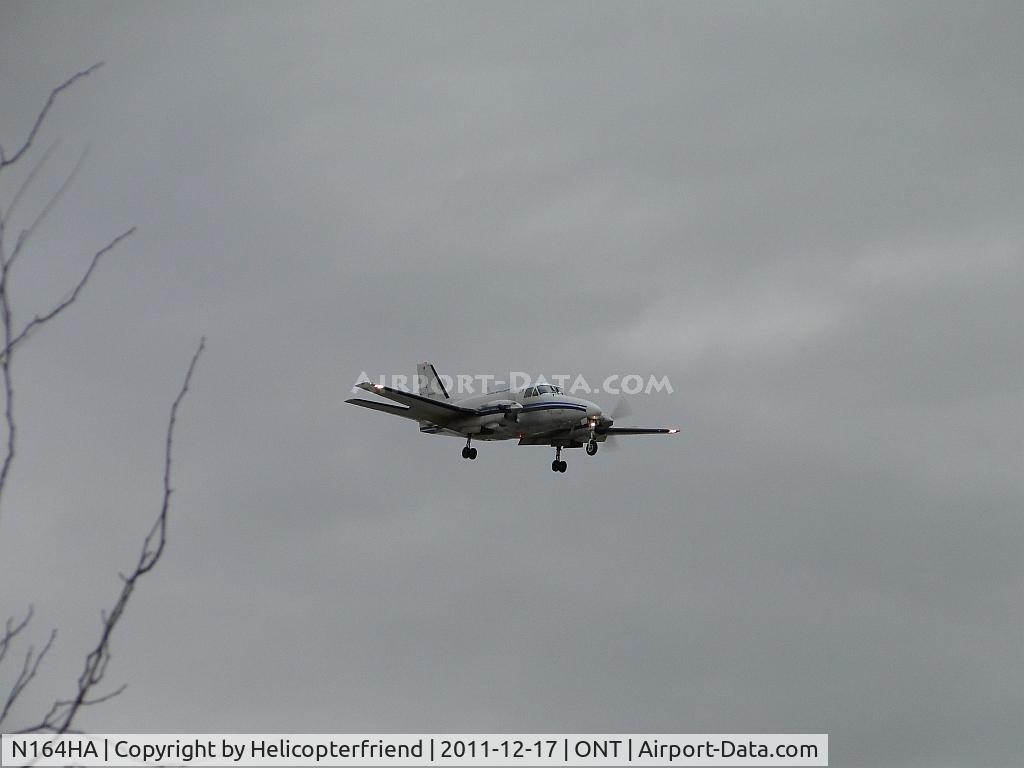 N164HA, 1968 Beech 99 C/N U-60, On final for runway 8R