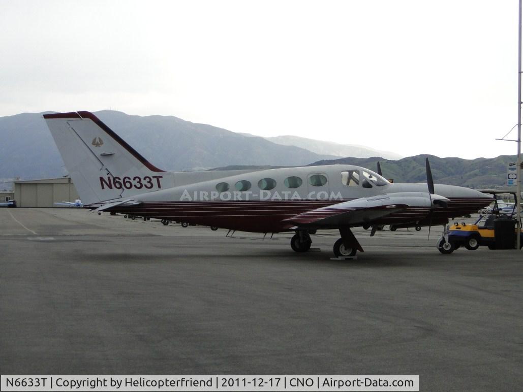 N6633T, 1977 Cessna 421C Golden Eagle C/N 421C0277, Parked on a very overcast day, with rain starting to fall