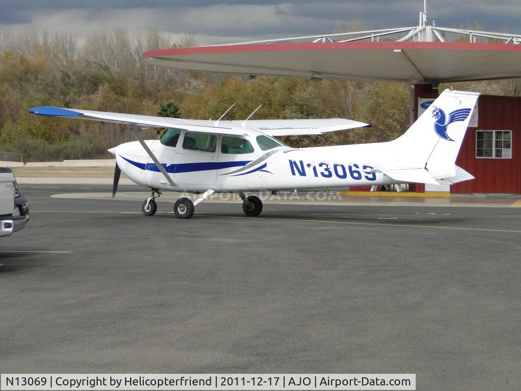 N13069, 1973 Cessna 172M C/N 17262472, Parked near the Pilot's Lounge and fuel station