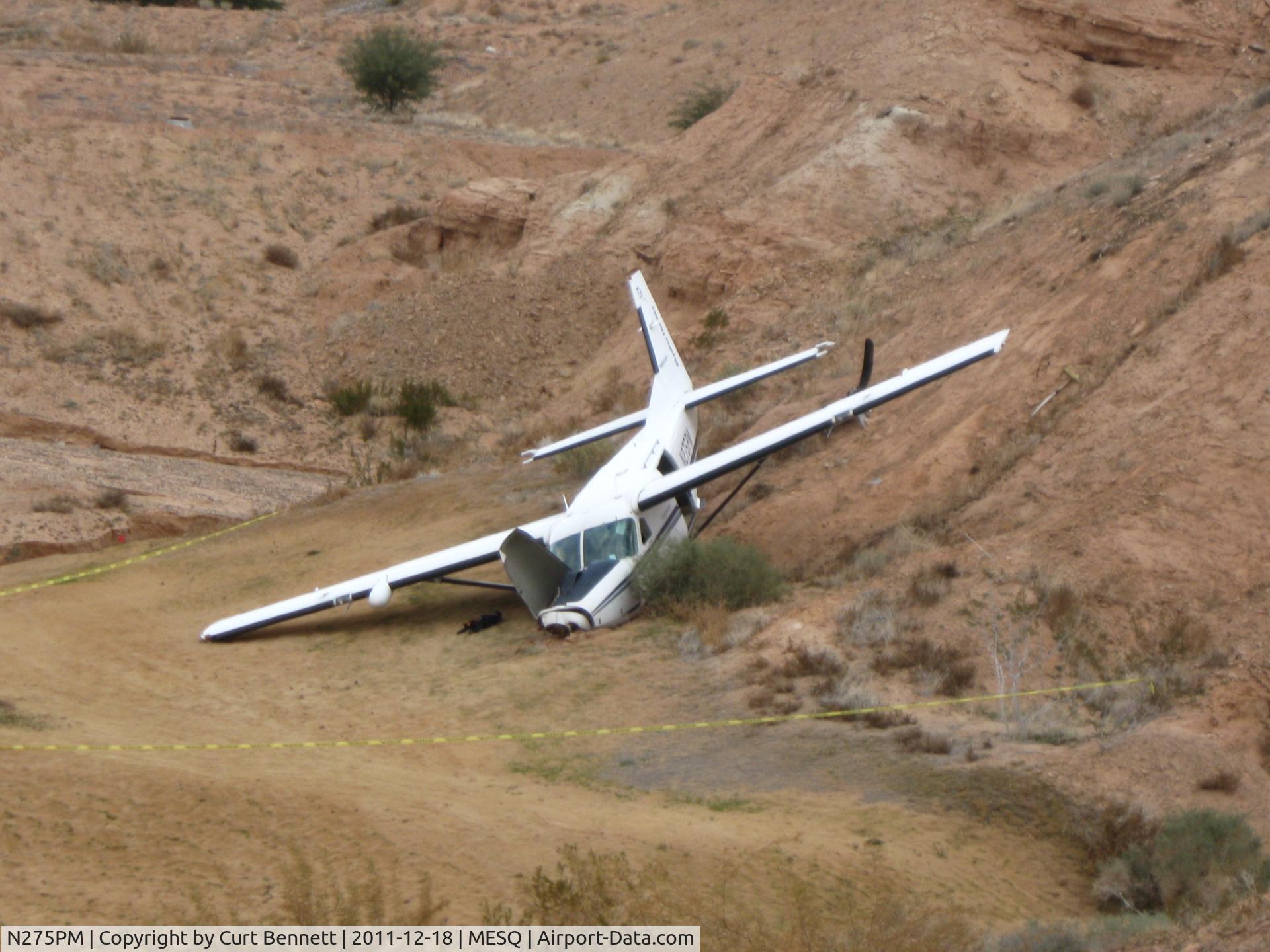 N275PM, 1987 Cessna 208A Cargomaster C/N 208-00119, Laying on #17 at Canyons Golf Club Mesquite,NV.