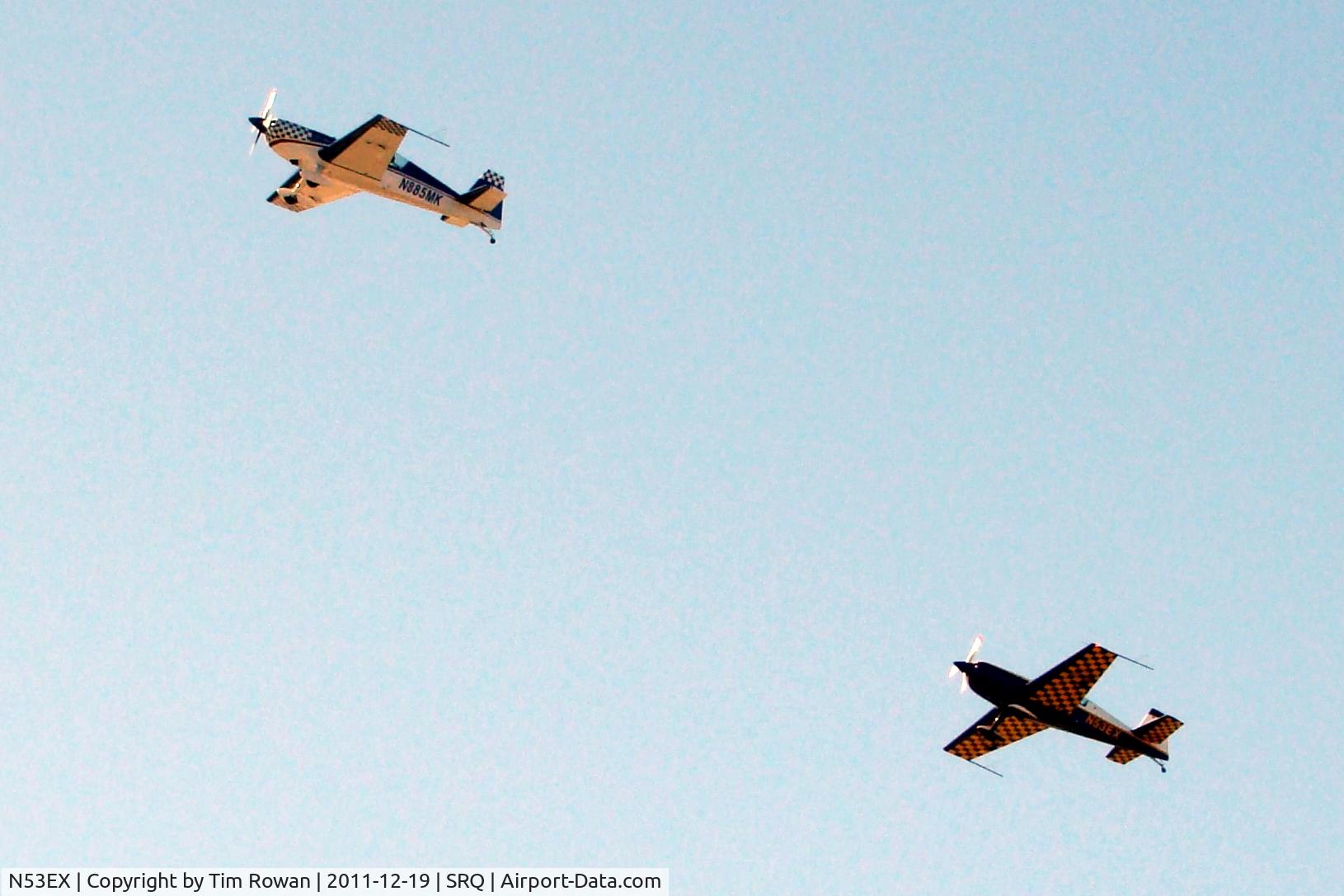 N53EX, 2006 Extra EA-300/L C/N 1248, Two ship set flying out of Sarasota/Bradenton Airport Florida. Leading A/C is N885MK