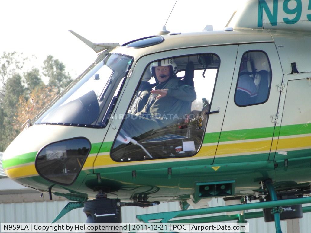 N959LA, Eurocopter AS-350B-2 Ecureuil C/N 7092, While landing at LA CO Air Ops helipad 5, the FTO appears to be explaining something to passenger behind him.