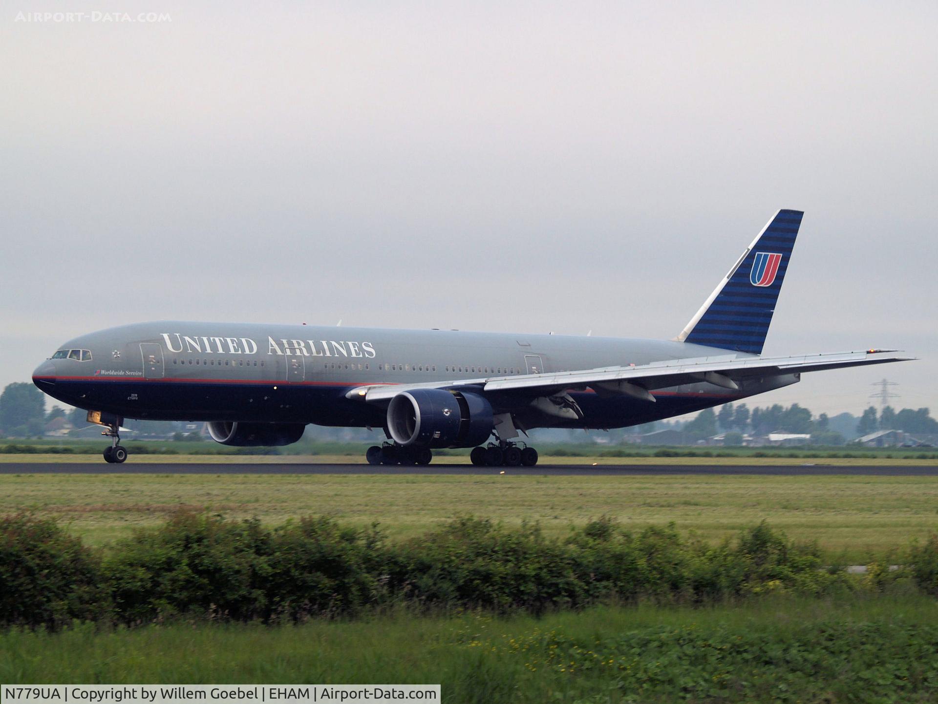 N779UA, 1996 Boeing 777-222 C/N 26941, Landing on runway R18 of Amsterdam Airport.