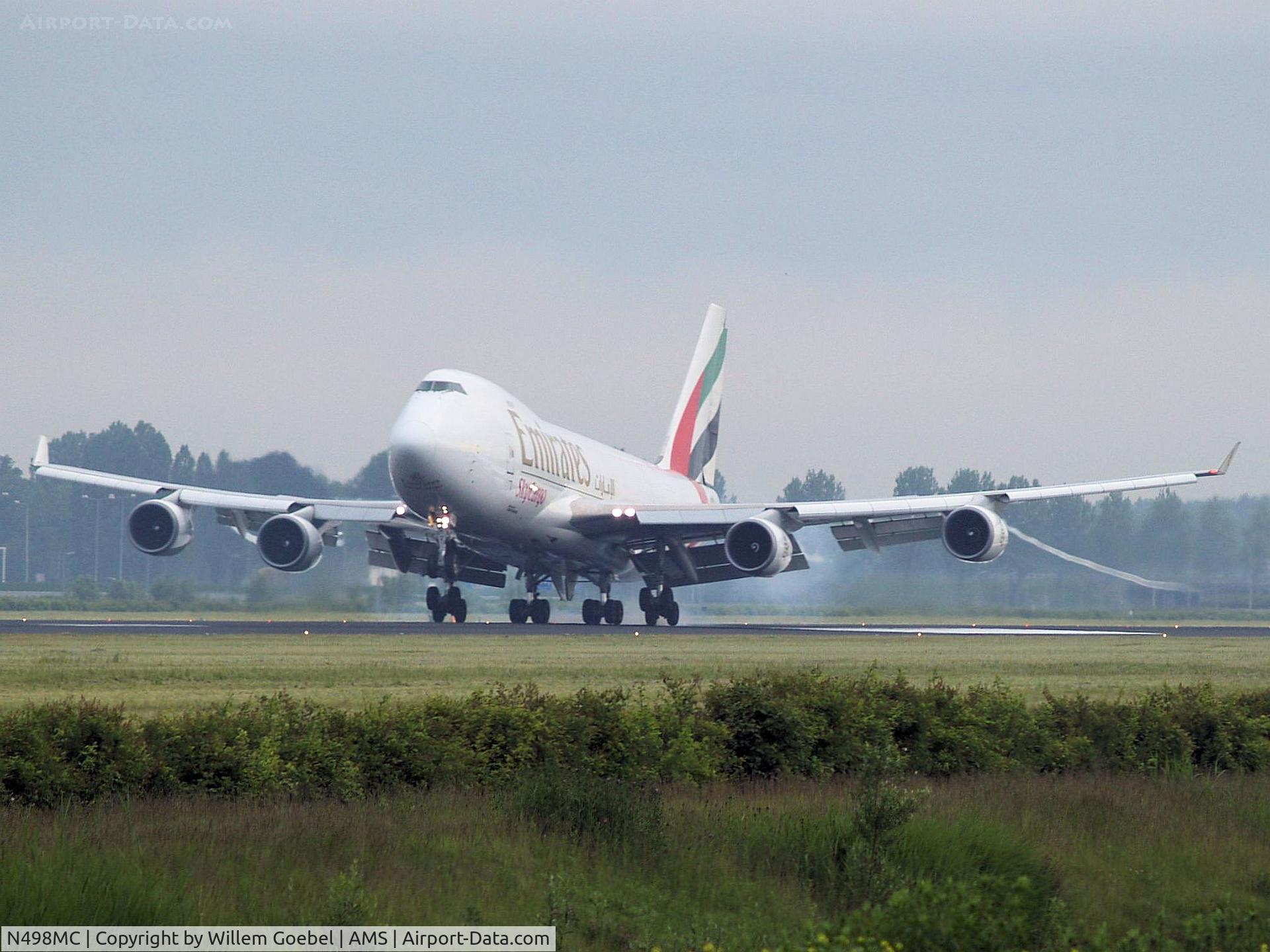 N498MC, 1999 Boeing 747-47UF C/N 29259, Landing on runway R18 of Amsterdam Airport.