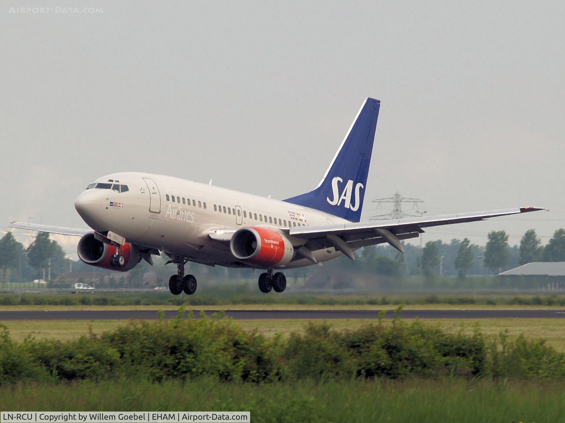 LN-RCU, 1999 Boeing 737-683 C/N 30190, Landing on runway R18 of Amsterdam Airport.