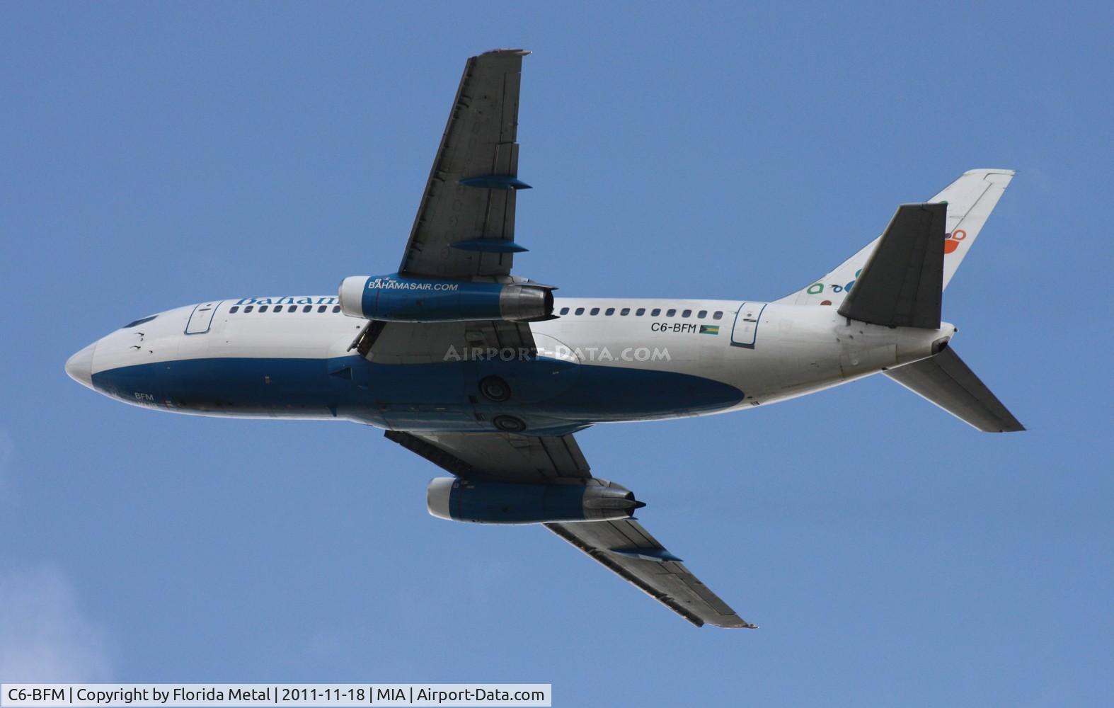 C6-BFM, 1981 Boeing 737-2K5 C/N 22596, Most planes departing on Runway 27 are usually too high up at El Dorado, but these old 737-200s take off lower.  Stupid cloud interfered with shot however
