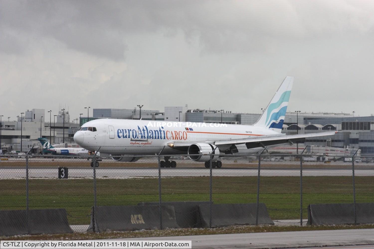 CS-TLZ, 1988 Boeing 767-375 C/N 24086, Euro Atlantic Cargo from Portugal landing on 27 - taken from 94th Aero Squadron with clouds
