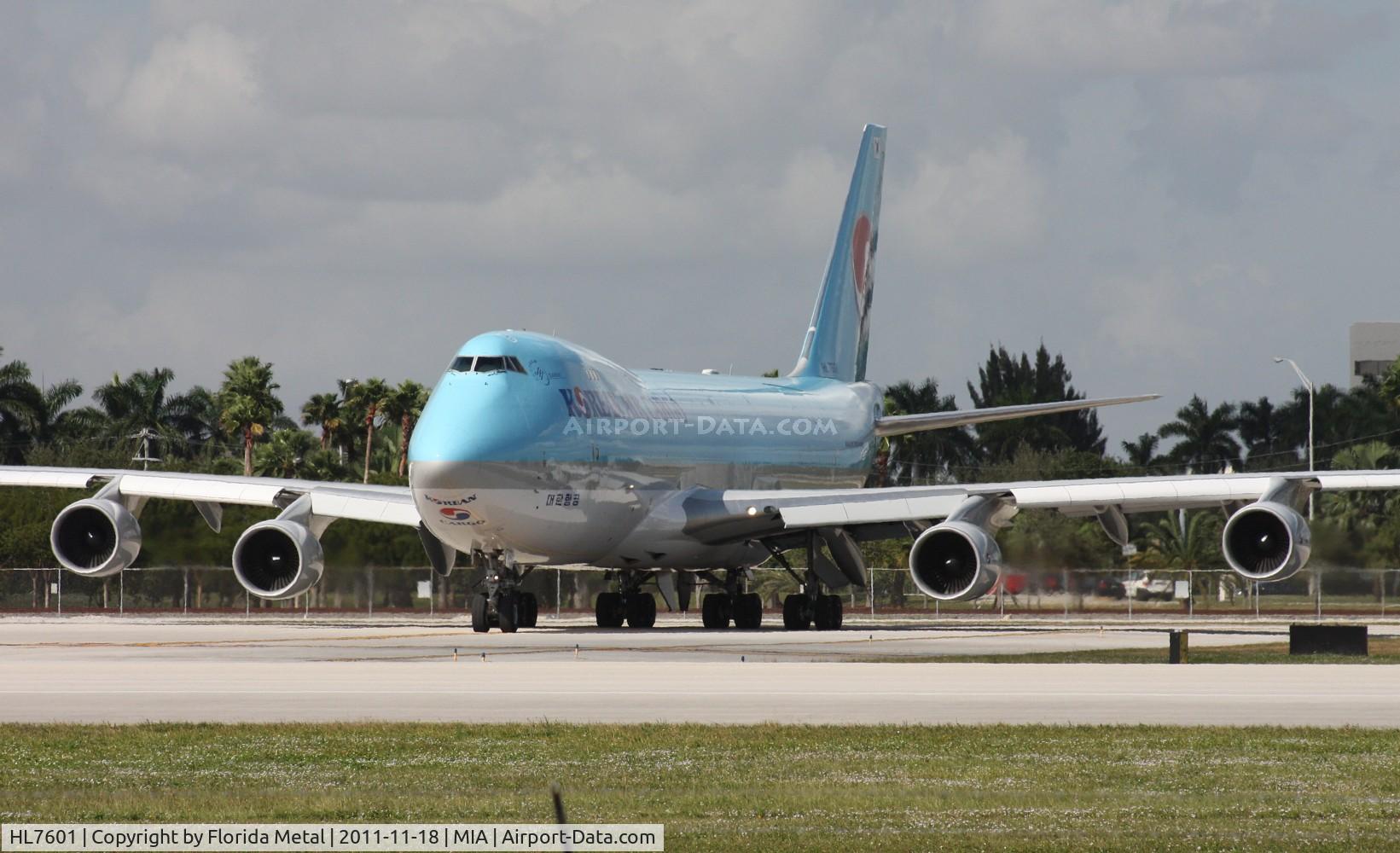 HL7601, 2004 Boeing 747-4B5F/SCD C/N 33949, Taken from El Dorado, this Korean Cargo 747 is holding short for departure on Runway 9