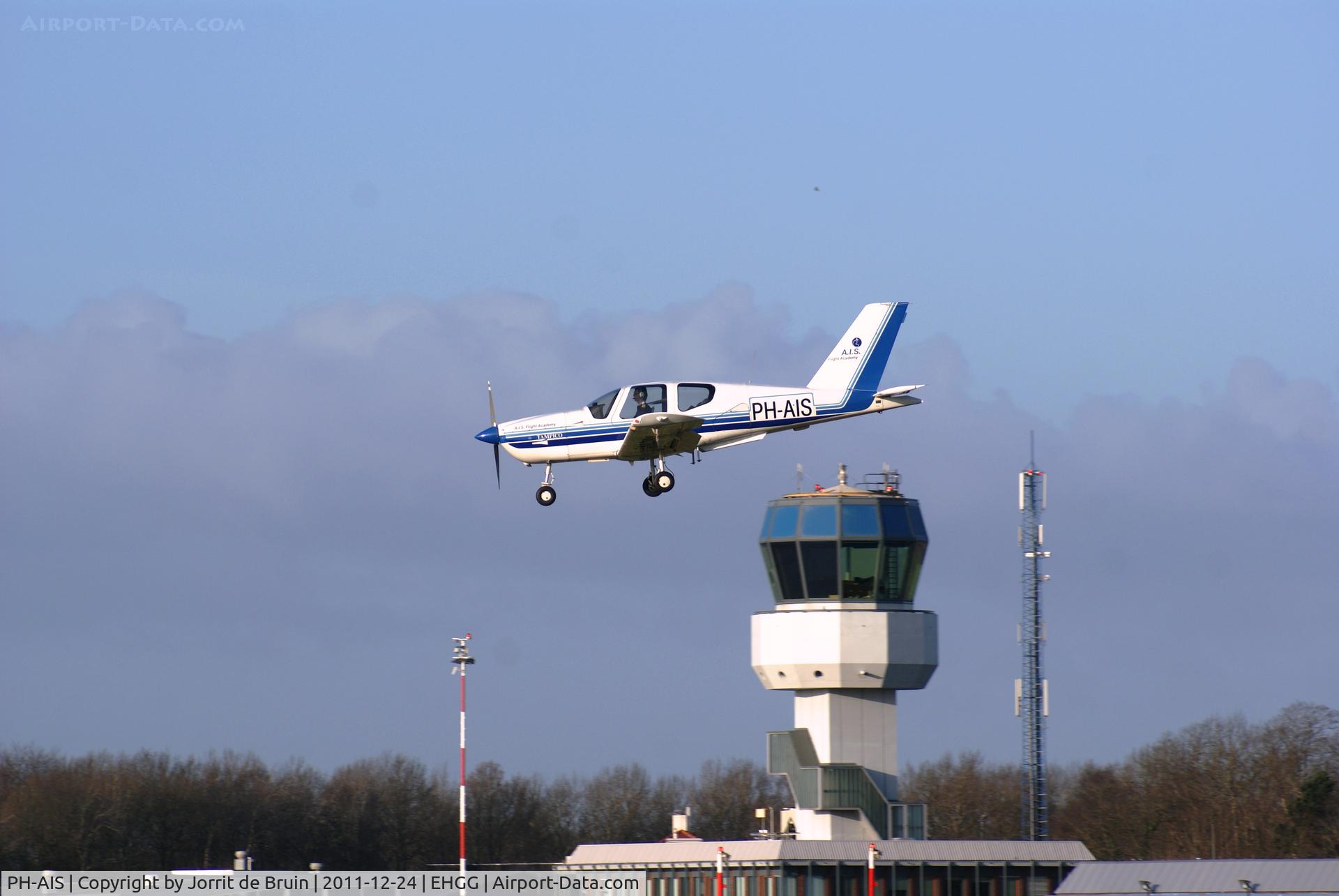 PH-AIS, 1991 Socata TB-9 Tampico C/N 1260, At the final approach of runway 23. The tower of Eelde is in sight.