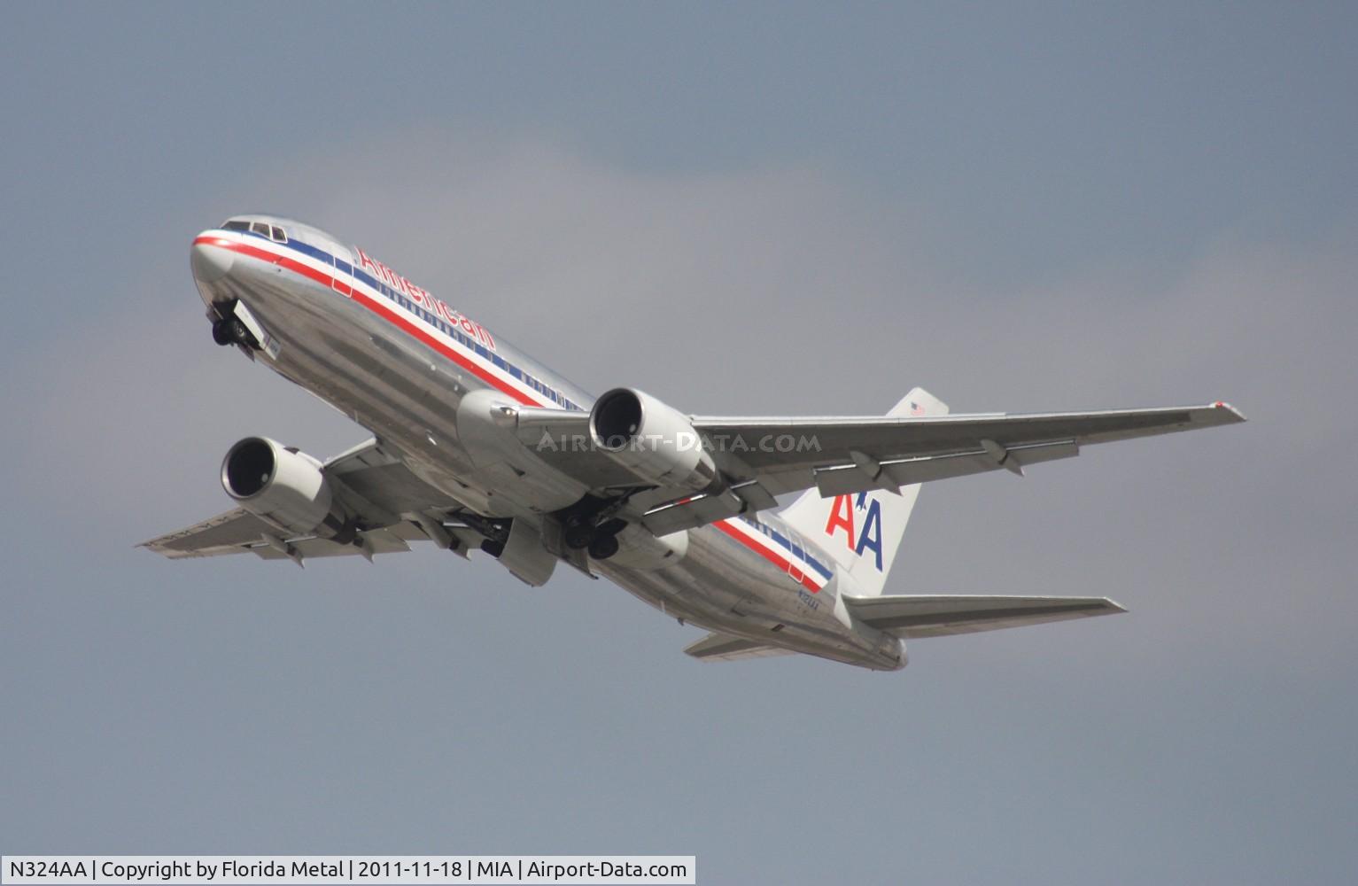 N324AA, 1986 Boeing 767-223 C/N 22325, Not sure how much longer American is going to keep these 200 series birds.  Departing 26L, I am by the photo holes
